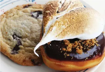  ??  ?? From Corner Peach’s baked-goods showcase, the brown butter chocolate chip cookie is totally on point.