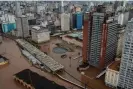  ?? ?? An aerial shot of central Porto Alegre reveals the extent of flooding around the public market and city hall