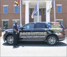  ?? STAFF PHOTO BY JESSI STICKEL ?? Recruiter Jesse Williams will be driving around the sheriff’s office new recruiting SUV, hoping to advertise the agency and get people interested in working for CCSO.