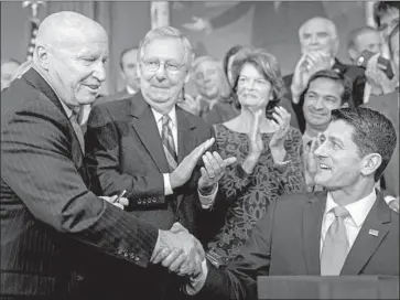  ?? Andrew Harnik Associated Press ?? REP. KEVIN Brady, left, who helped draft the Republican tax bill, criticized efforts to circumvent the law.