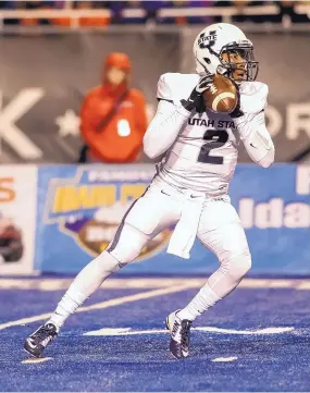  ?? AP FILE ?? Utah State quarterbac­k Kent Myers is back to operate an offense that features running back Devante Mays and a strong offensive line.