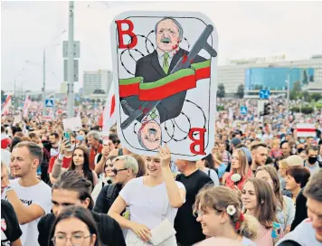  ??  ?? Belarus protests: opposition supporters attend a rally to voice their anger over the disputed August 9 presidenti­al election results