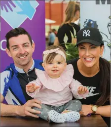  ?? ABOVE: ?? Aidan and Denise O’Mahony with their daughter Lucia at the Unsung Hero Charity Cycle at Ballyseedy Garden Centre on Saturday.