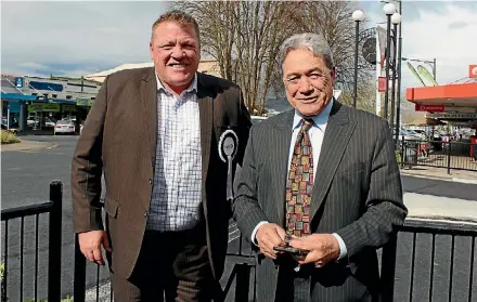  ?? MIKE BAIN ?? New Zealand First leader Winston Peters and his Waikato candidate Stu Husband, in Matamata, shortly after appearing at the farmers protest in Morrinsvil­le. Philippa Stevenson