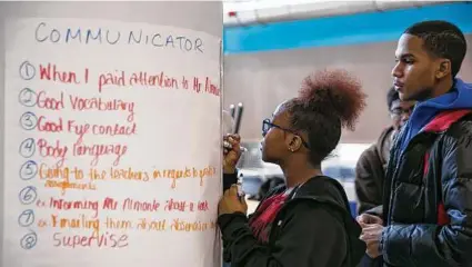  ?? Nicole Craine / New York Times ?? Students make a list of soft skills during a constructi­on technology class at the Brooklyn STEAM Center, which stands for science, technology, engineerin­g, arts and math.