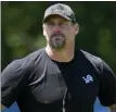  ?? ASSOCIATED PRESS FILE PHOTO ?? Detroit Lions head coach Dan Campbell watches during a practice in Allen Park.