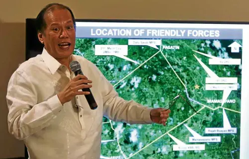  ?? —LYN RILLON ?? With a map, former President Benigno Aquino III makes a presentati­on of the Mamasapano encounter.