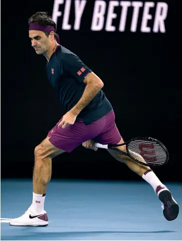  ?? AP/GETTY IMAGES ?? Roger Federer pulled out all the tricks, including a between-the-legs shot, but still fell to a straight sets defeat to Novak Djokovic in the Australian Open men’s singles semifinals in Melbourne.