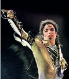  ?? ?? Michael Jackson performs in 1997.