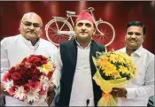  ?? PTI ?? Samajwadi Party President Akhilesh Yadav greets former BSP leaders Dayaram Pal and Mithai Lal Bharati after they joined (SP) at the party office, in Lucknow, Friday