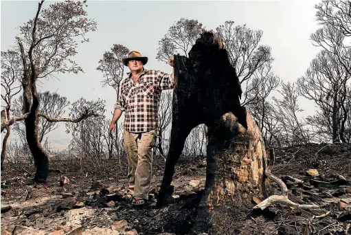  ?? SYDNEY MORNING HERALD ?? Matthew Hulse, of Braidwood in the New South Wales Southern Tablelands, is among the many farmers who’ve had to defend their homes and properties from the bushfires ravaging the state. The fire danger is ramping back up and is expected to continue escalating next week, with increasing heat and dry winds.