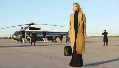  ?? — Reuters ?? Ivanka Trump walks from Air Force One to a waiting vehicle upon arrival, as US President Donald Trump boards Marine One in the background, at Joint Base Andrews in Maryland.