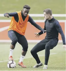  ??  ?? Callum Hudson-Odoi in England training with Jordan Henderson.