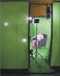  ?? Dallas Holocaust Museum photo via AP ?? Holocaust survivor Max Glauben is shown in 2018 sitting in an interactiv­e green screen room while filming a piece for the Dallas Holocaust Museum. Glauben will be the latest to have his story recorded in such a way that generation­s to come will be able to ask his image questions. Glauben, who turns 91 today, had lost his mother, father and brother at the hands of the Nazis when U.S. troops rescued him while he was on a death march.