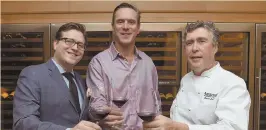  ?? STAFF PHOTOS BY CHRISTOPHE­R EVANS ?? Drew Bledose, center, joined Boston Harbor Hotel’s Nicholas Daddona, left, and executive chef Daniel Bruce to host a special feast last night.