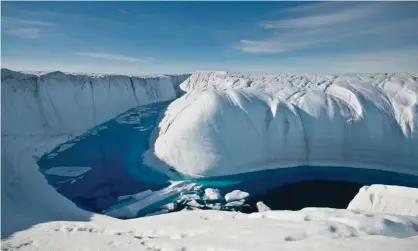  ?? Photograph: Ian Joughin/University of Washington/PA ?? A meltwater canyon on the Greenland ice sheet.