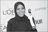  ?? AP/Invision/EVAN AGOSTINI ?? Ibtihaj Muhammad holds a Barbie doll in her likeness Monday during the 2017 Glamour Women of the Year Awards at Kings Theatre in New York.