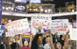  ?? MATT ROURKE/ASSOCIATED PRESS ?? California delegates hold up signs Wednesday as they cheer during the third day of the Democratic National Convention in Philadelph­ia.