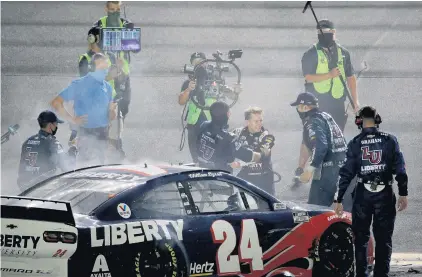  ?? CHRIS GRAYTHEN/GETTY IMAGES ?? William Byron, driver of the No. 24 Chevrolet, celebrates with his team Saturday night after winning the NASCAR Cup Series’ Coke Zero Sugar 400 at Daytona Internatio­nal Speedway in Florida. The win sealed a berth in the playoffs, which won’t include Hendrick teammate Jimmie Johnson.