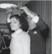  ??  ?? Boston Marathon Race Director, Will Cloney, places a laurel wreath on the head of Montreal’s Jacqueline Gareau as the champion of the Boston Marathon after it was discovered that Rosie Ruiz, who crossed the finish line first had cheated and not run the...