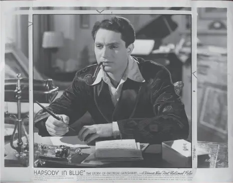  ?? Chronicle file photo ?? Robert Alda mimed playing the piano in the 1945 fictionali­zed George Gershwin screen biography “Rhapsody in Blue.”