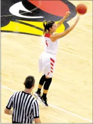  ?? MARK HUMPHREY ENTERPRISE-LEADER ?? Farmington junior Madisyn Pense launches a 3-pointer from the right wing during the 5A West Conference tournament hosted by Farmington at Cardinal Arena last week. Pense knocked down four 3-pointers and scored 18 points in the finals as the Lady...