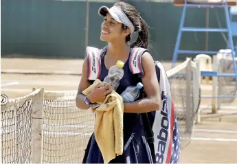  ??  ?? Sri Lanka's future Tennis star Adithya Karunaratn­e is making strides at global level