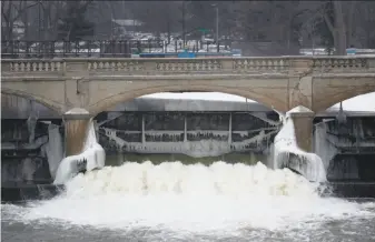  ?? Paul Sancya / Associated Press ?? The water in Flint, Mich., became tainted with lead when the city switched from the Detroit system in 2014 and began drawing from the Flint River, seen here last month, to save money.