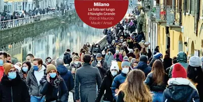  ??  ?? Milano
La folla ieri lungo il Naviglio Grande (foto di Maurizio Maule / Ansa)