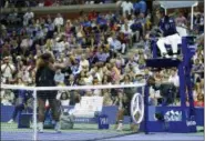  ?? JULIO CORTEZ - THE ASSOCIATED PRESS ?? Serena Williams argues with chair umpire Carlos Ramos during a match against Naomi Osaka in the women’s final of the U.S. Open, Saturday, in New York.