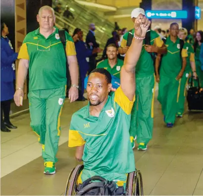  ?? Picture: Gallo Images ?? ANTICIPATI­ON. Wheelchair tennis player Lucus Sithole of the SA Paralympic team in good spirits during their departure to Rio de Janeiro this week.