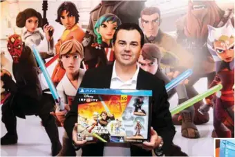  ??  ?? (left) Jason Moffitt, producer at Disney Interactiv­e, with the new Disney Infinity 3.0 starter set at the launch event in Kuala Lumpur recently.
(below) Gamers will now be able to use their favourite Jedi or Sith characters to slice and dice enemies...