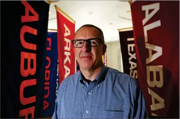  ?? AP PHOTO BY BRYNN ANDERSON ?? In this May 23 file photo, Southeaste­rn Conference commission­er Greg Sankey poses in Birmingham, Ala. There are 130 major college football teams, spread across 41 states and competing in 10 conference­s, save for a handful of independen­ts.