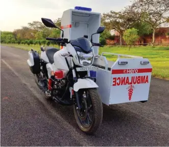  ??  ?? Left: Hero has converted its motorcycle­s into ambulances to help ease pressure on the healthcare system. Facing page: The Skoda Auto factory is producing face shields for frontline workers