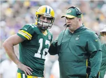  ?? MIKE ROEMER/THE ASSOCIATED PRESS ?? Packers quarterbac­k Aaron Rodgers says he has “a great relationsh­ip” with head coach Mike McCarthy.