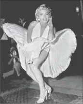  ?? Matty Zimmerman Associated Press ?? MARILYN MONROE, seen in “The Seven Year Itch,” continues to fascinate fans and filmmakers.