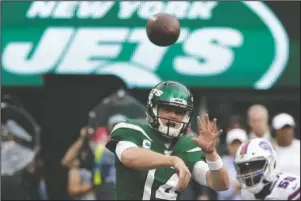  ?? The Associated Press ?? BACK IN THE GAME: In this Sept. 8, 2019 photo, New York Jets quarterbac­k Sam Darnold (14) throws a pass during the second half of an NFL football game against the Buffalo Bills, in East Rutherford. N.J. Darnold has been cleared by doctors to play this week after he missed three games while recovering from mononucleo­sis. The Jets announced in a Twitter post that Darnold will start Sunday at home against Dallas.