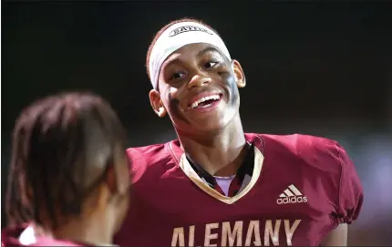  ?? PHOTO BY ANDY HOLZMAN ?? Alemany receiver/defensive back Mike Lindsay smiles after the Warriors beat Lawndale 34-27on Friday night for their first victory of the season.