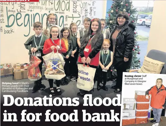  ??  ?? Helping hand St Mark’s Primary pupils with their donation to Rutherglen and Cambuslang Foodbank