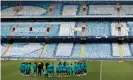  ?? ?? Carlo Ancelotti gathers his players during a training session at the Etihad Stadium. Photograph: Tom Jenkins/The Guar