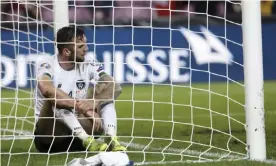  ??  ?? Ireland’s defender Shane Duffy reflects after failing to keep Switzerlan­d’s second goal out of the net deep into injury time. Photograph: Salvatore Di Nolfi/EPA