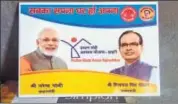  ?? HT ?? Tiles bearing PM Narendra Modi and CM Chouhan’s photos