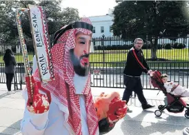  ?? /Reuters ?? Protest: An activist dressed as Saudi Crown Prince Mohammad bin Salman marches in front of the White House in Washington during a demonstrat­ion calling for sanctions against Saudi Arabia and against the disappeara­nce of Saudi journalist Jamal Khashoggi.
