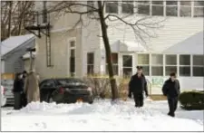  ?? LORI VAN BUREN — THE ALBANY TIMES UNION VIA AP ?? Troy police investigat­e multiple deaths at 158 Second Ave. on Tuesday in Troy, N.Y. Police say four people have been found dead and may have been killed in an apartment in New York’s capital region. The bodies were discovered Tuesday afternoon in a...