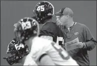  ?? Arkansas Democrat-Gazette/RICK MCFARLAND ?? Ouachita Baptist Coach Todd Knight (right) has led the Tigers to their first postseason appearance since the 1968 Peanut Bowl.The Tigers host Minnesota-Duluth today in an NCAA Division II playoff game.