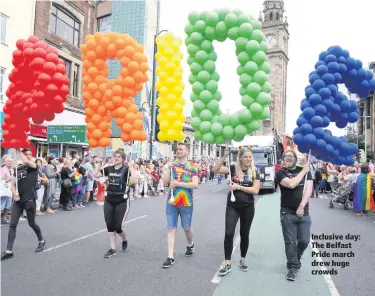  ??  ?? Inclusive day: The Belfast Pride march drew huge crowds