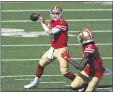  ?? ADAM HUNGER — THE ASSOCIATED PRESS ?? San Francisco 49ers quarterbac­k Nick Mullens (4) in action against the Jets during their game last Sunday in East Rutherford, N.J.