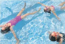  ??  ?? Kids chill out in the Mestizo-curtis Park outdoor pool in August 2014. Kathryn Scott, Denver Post file