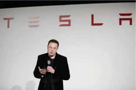  ?? MARCIO JOSE SANCHEZ/THE ASSOCIATED PRESS FILE PHOTO ?? Elon Musk, CEO of Tesla Motors Inc., delivered the good news with the bad on Wednesday, assuring them the electric sedan will be delivered on time.