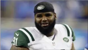  ?? DUANE BURLESON — THE ASSOCIATED PRESS FILE ?? New York Jets defensive end Sheldon Richardson walks off the field following a preseason football last summer. The Jets picked up Richardson’s fifth-year option.